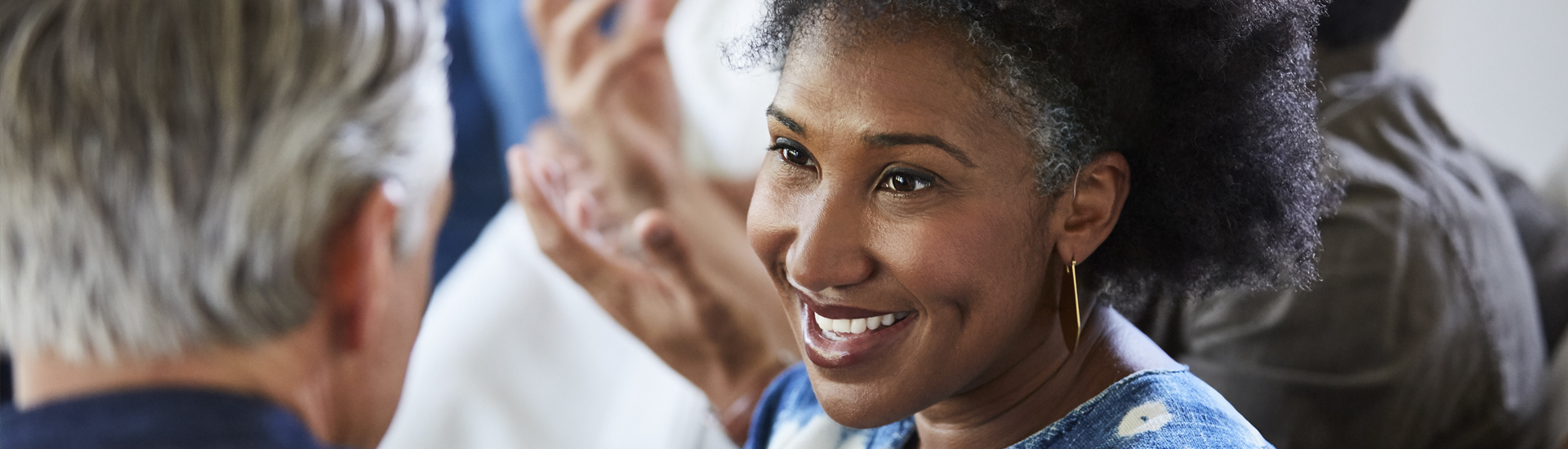 sustainability-at-a-glance-woman-in-conversation