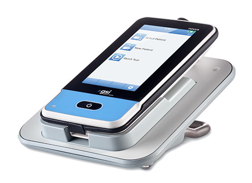 Novus Newborn Hearing Screener from Grason-Stadler in charging cradle