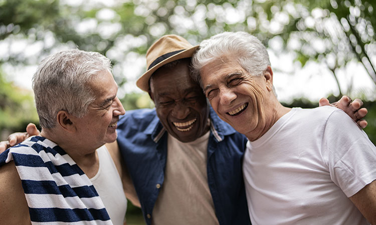 ph_blog_post_3_men_laughing_by_pool_gettyimages-1390899974_750x450