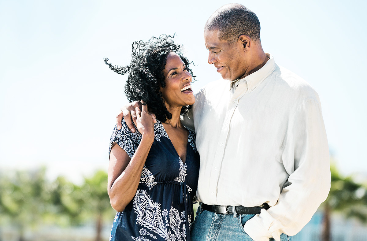 couple woman and man hanging smiling outside