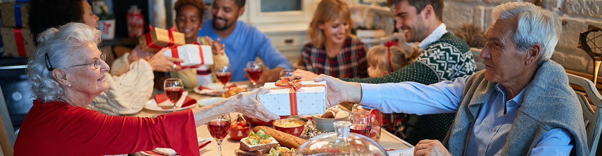 family exchanging gifts